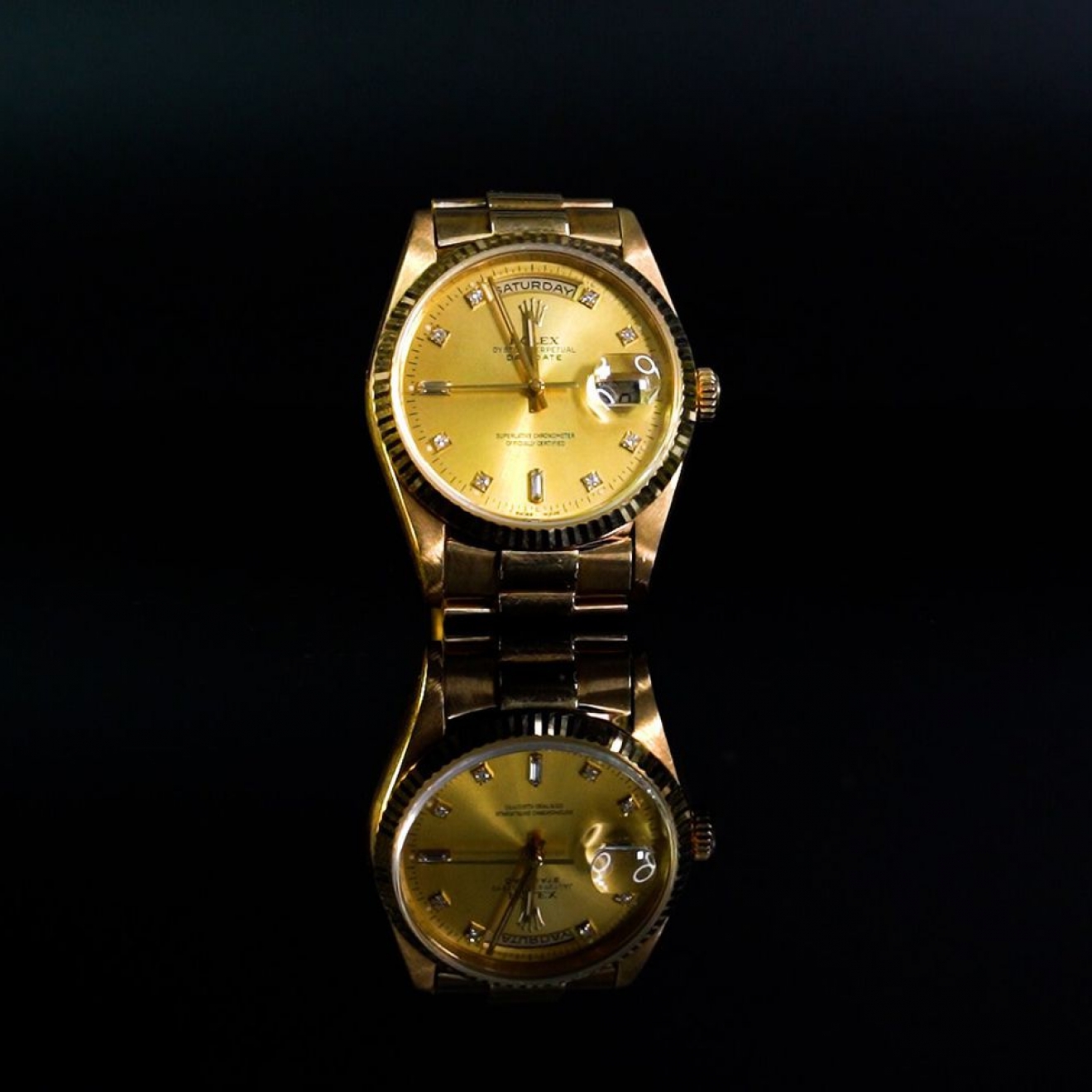 Đồng hồ Rolex Day Date vàng khối